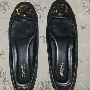 Michael Kors Black Ballet Flats with Gold Logo Accent